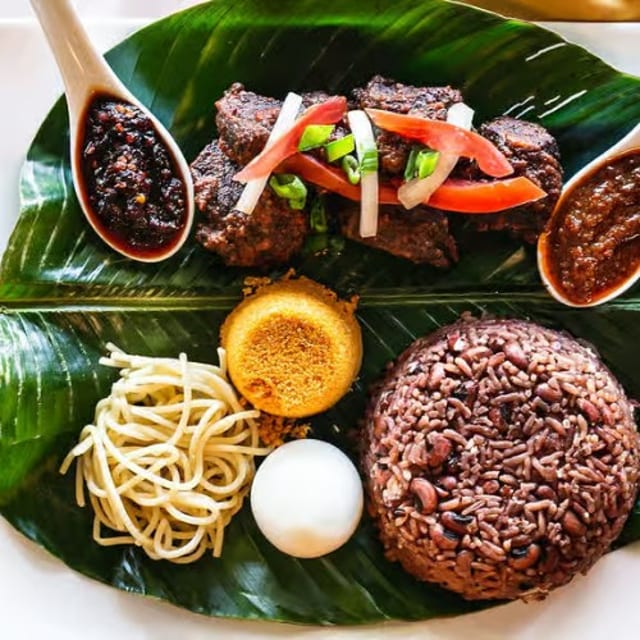 Waakye and Stew (Choose Goat or Beef).