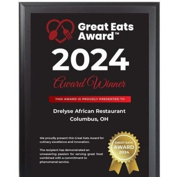 Drelyse African Restaurant's 2024 Great Eats Award plaque, recognizing culinary excellence and service.