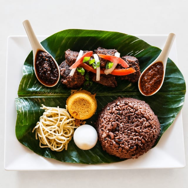 Waakye and Stew (Choose Goat or Beef).