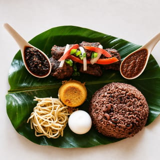 Waakye and Stew (Choose Goat or Beef)