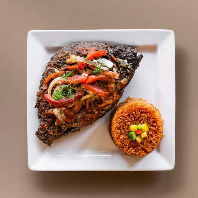 Jollof Rice and Tilapia Fish.